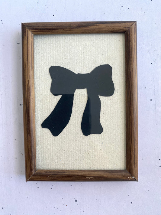 Hand-Cut Bow Silhouette in a Vintage Frame