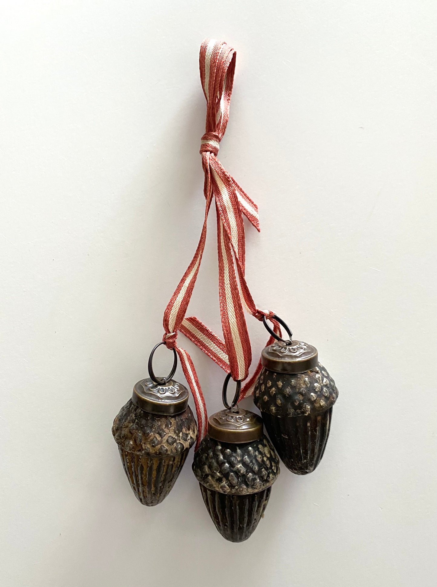 Antique Glass Trio of Acorns on Ribbon