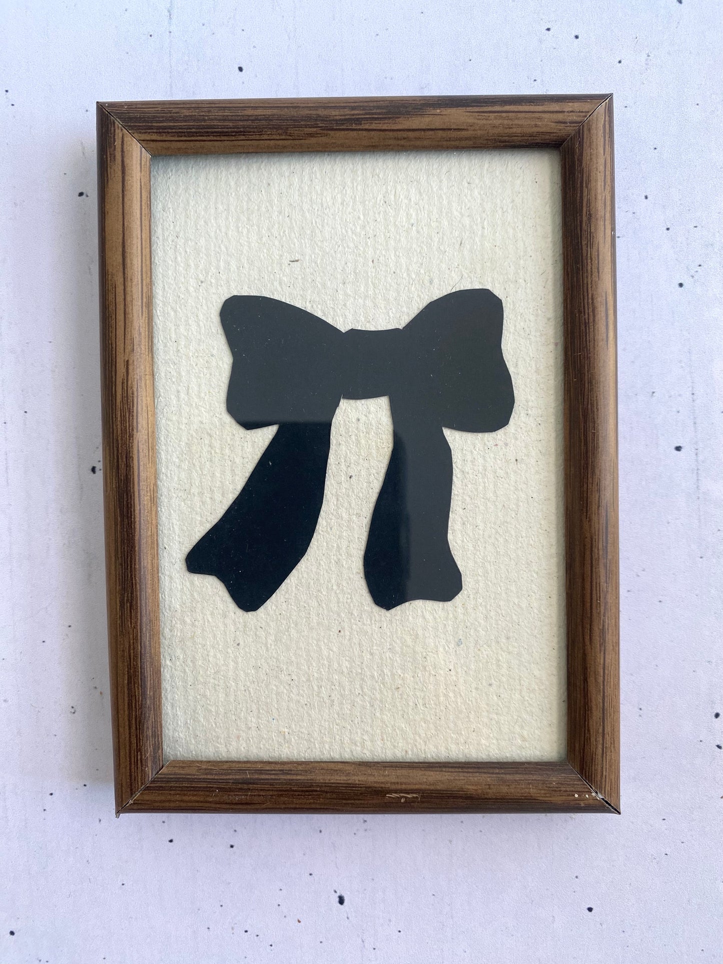 Hand-Cut Bow Silhouette in a Vintage Frame